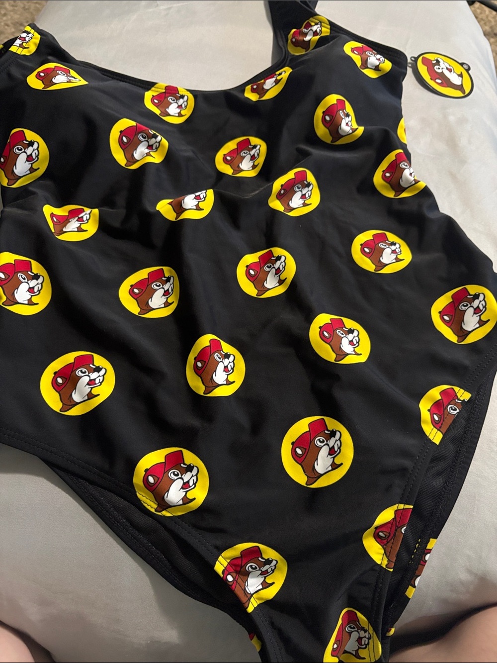 Buc-ees Black One-Piece Swimsuit with Yellow & Red Character Print